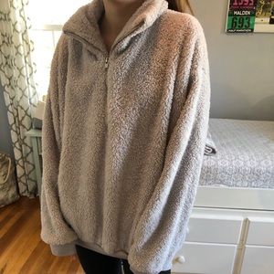 Fuzzy gray quarter zip sweater.